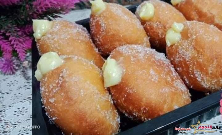 دوناتس بحشو الكاسترد... مقدم من الشيف : فاطمة عطية 2 دوناتس بحشو الكاسترد... مقدم من الشيف : فاطمة عطية
