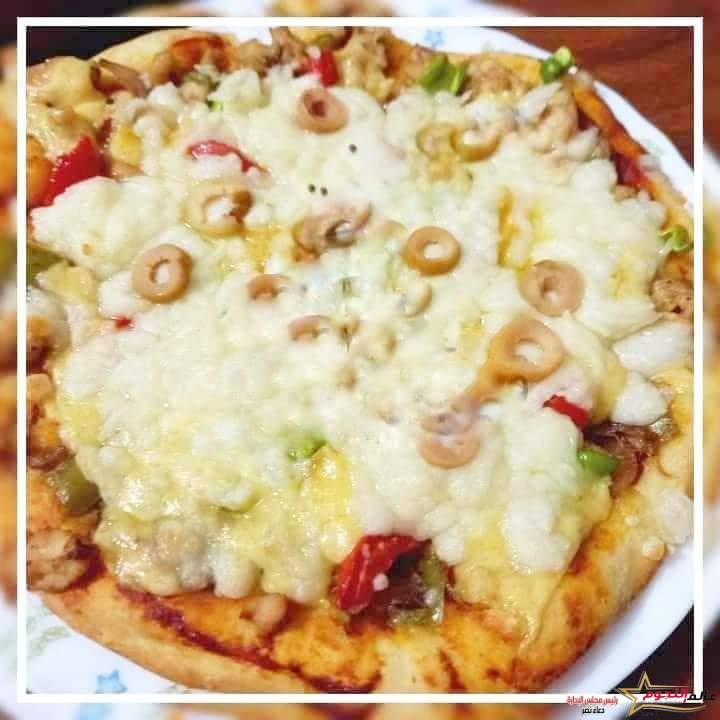 بيتزا الدجاج ... مقدمة من الشيف: منى التابعي