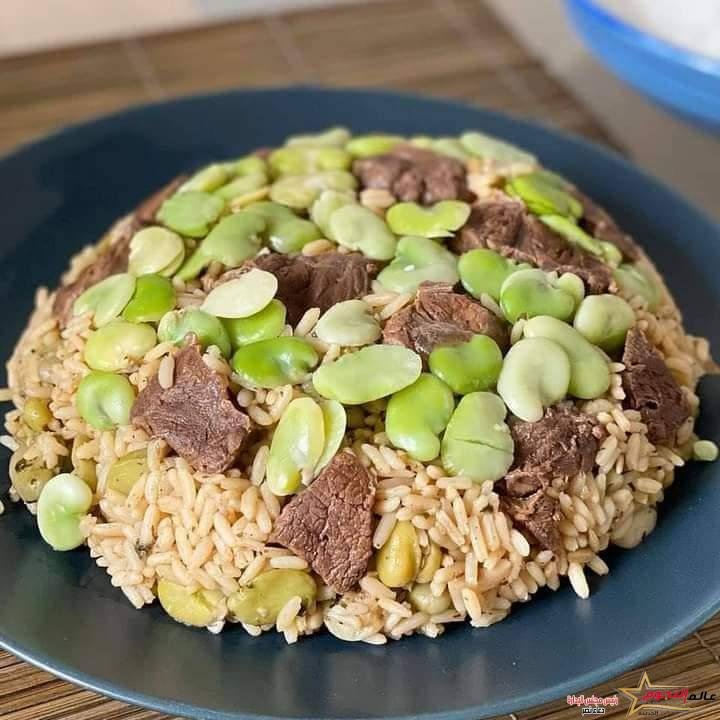 أرز بالفول واللحم (الكزبرية ) ... مقدم من: مطبخ عالم النجوم 2 أرز بالفول واللحم (الكزبرية ) ... مقدم من: مطبخ عالم النجوم