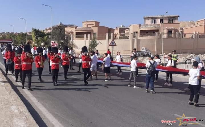 صبحي يشهد الاحتفال بذكرى انتصارات أكتوبر المجيدة بحمل أطول علم في تاريخ المسيرات الرياضية بالجيزة 4 صبحي يشهد الاحتفال بذكرى انتصارات أكتوبر المجيدة بحمل أطول علم في تاريخ المسيرات الرياضية بالجيزة
