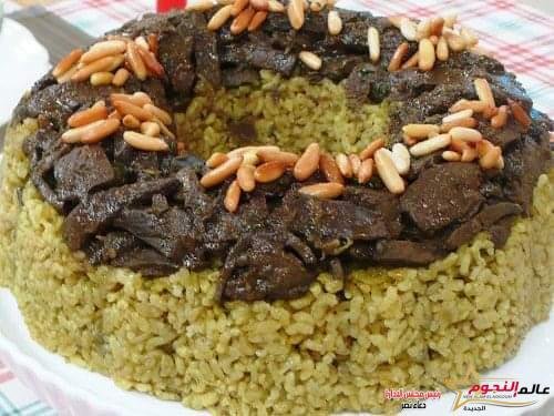 أرز بالكبد والقوانص ... مقدم من: مطبخ عالم النجوم