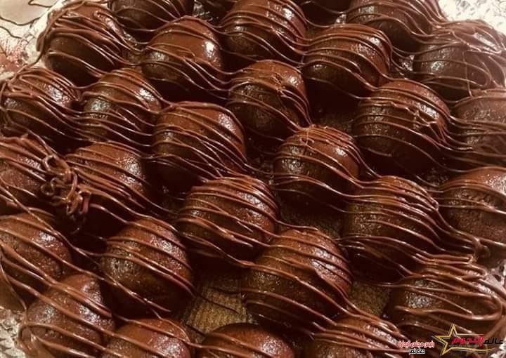 كرات البسكويت باللبن المكثف والنوتيلا ... مقدمة من: مطبخ عالم النجوم 2 كرات البسكويت باللبن المكثف والنوتيلا ... مقدمة من: مطبخ عالم النجوم