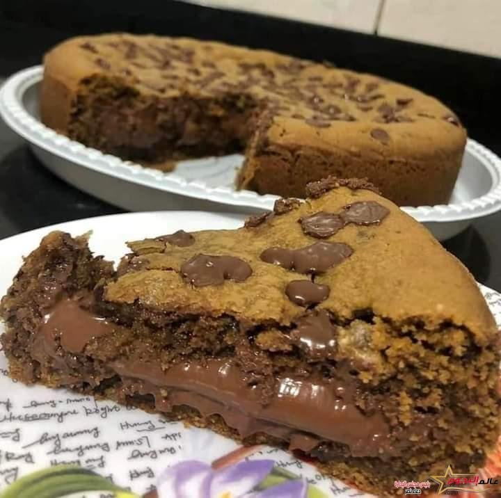 كيك الكوكيز بالنوتيلا ... مقدم من: مطبخ عالم النجوم 2 كيك الكوكيز بالنوتيلا ... مقدمة من : مطبخ عالم النجوم