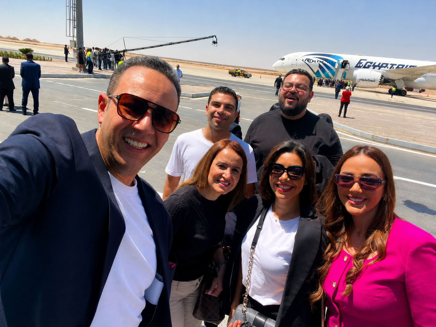 نجوم الفن والإعلام والرياضة في استقبال أبطال منتخب مصر بمطار العلمين وسط احتفالات جماهيرية بالإنجاز التاريخي 3 نجوم الفن والإعلام والرياضة في استقبال أبطال منتخب مصر بمطار العلمين وسط احتفالات جماهيرية بالإنجاز التاريخي